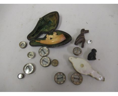 Collection of miniature compasses, mother of pearl magnifying glass, small cased Meerschaum pipe etc. 