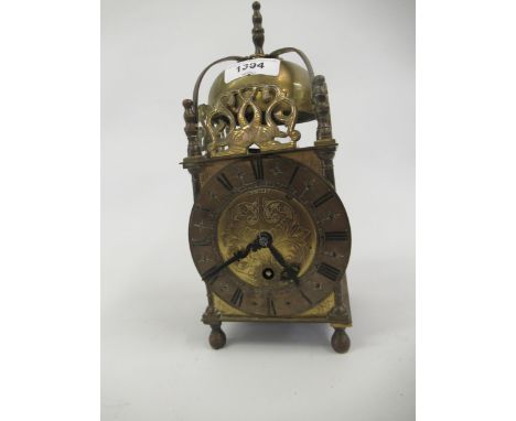 Small reproduction brass cased lantern clock with single train keywind movement by Smiths, 9.5ins high 