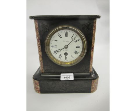 19th Century black slate marble mounted mantel clock, the enamel dial with Roman numerals and a single train movement 
