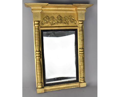 A Mid 19th Century Regency Giltwood Pier Mirror with Half Pilasters Either Side, Architectural Cornice Over a Panel with Scro