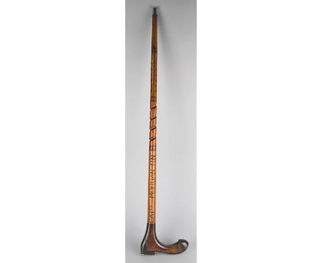 A Late 1930's Scottish Carved Walking Stick the Novelty handle in the Form of a Steel Capped Boot, the Shaft Inscribed Capt M