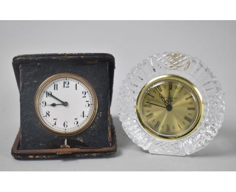 A Vintage Folding Travel Alarm Clock together with a Circular  Tyrone Lead Crystal Mantel Clock 