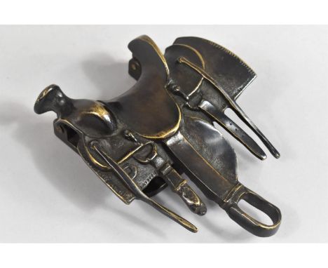 A Novelty Patinated Bronze Door Knocker in the Form of an American Saddle, 13cms Wide 