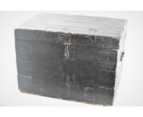 A Late Victorian Black Painted Wooden Traveling Trunk, the Hinged Lid with Original Paper Label for the Manufacturer, 53x35x3