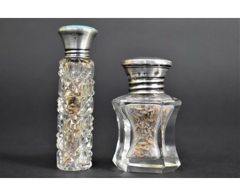 Two Glass and Silver Topped Dressing Table Scent Bottles, both with Birmingham Hallmarks for 1918 and 1923, the Taller Exampl