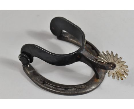 A Novelty American Door Knocker in the Form of a Horseshoe and Riding Spur, 18cms High 