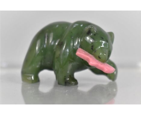 A Carved Jade Bear with a Pink Rhodonite Salmon in it's Mouth, 4cm wide 