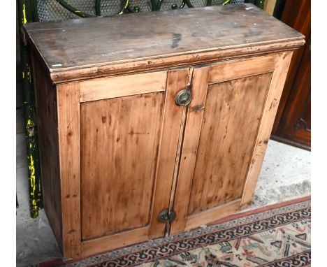 An old stripped pine kitchen shelf with three drawers 94 cm x 14 cm x 87 cm h to/w a stripped pine two door cupboard, 80 cm x