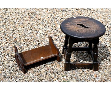 An old oak stool to/w a small oak bookrack and a vintage leather suitcase (3)