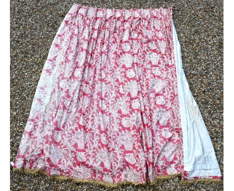 Pair of interlined cotton curtains with fringed ends, printed with birds, baskets of flowers and other motifs on a red ground