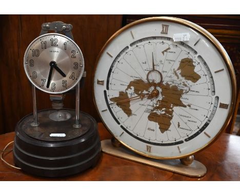 A Kundo (Germany) world clock with day/night 24 hour outer dial and map-face, to/w a French Bulle 800-Day Electric clock (a/f