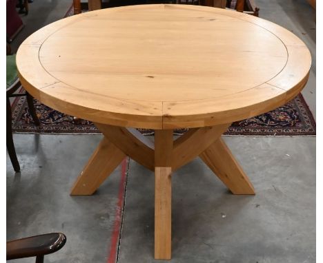A modern light oak circular dining table, 120 cm diam x 77 cm high