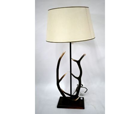 The Original Bookworks Ltd, an antler mounted table lamp, raised on a rectangular wooden base, approx. 85 cm h plus the shade