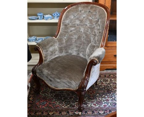A Victorian carved mahogany armchair with oyster button back dralon upholstery&nbsp;