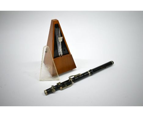A vintage ebonised piccolo with nickel-plated mounts,&nbsp;to/w a clockwork metronome (2)