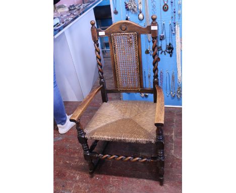 A vintage light oak rocking chair with wicker work seat, shipping unavailable 