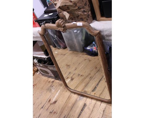 A vintage oak framed mirror with bevelled edge glass. No shipping. 