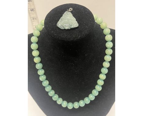 A vintage Jade? beaded necklace and Buddha pendant 