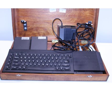 A vintage cased Sinclair QL computer (untested) 