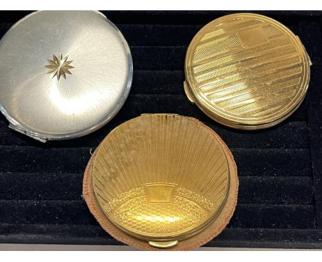 Three vintage Kigu compacts 