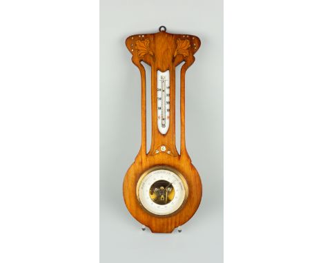 Jugendstil- Barometer mit Thermometer, um 1910 Nussbaum, HxB 50,5x20cm, stilisierte Blüte aus mit Messingbandeinlagen und Per
