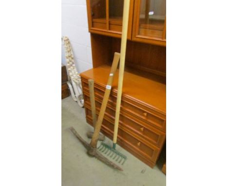 A pick axe, sledge hammer and garden rake, COLLECT ONLY.