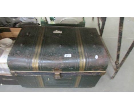 An early 20th century tin steamer trunk, COLLECT ONLY.