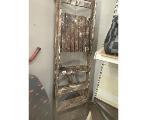 A vintage wooden step ladder