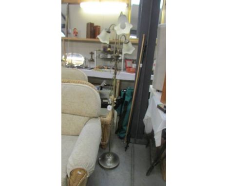 A three arm floor standing lamp. COLLECT ONLY