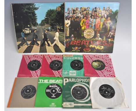 The Beatles, a collection of miscellaneous items to include Sgt. Peppers Lonely Hearts Club Band and Abbey Road LP's ( Sgt. P