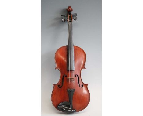 A late 19th/early 20th century French violin, having a two piece maple back and spruce top with ebony fingerboard and pegs, b