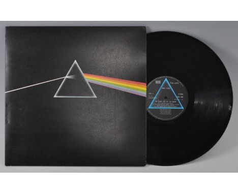 Pink Floyd, Dark Side Of The Moon, Harvest EMI SHVL 804 A - 8 / B - 7, in gate-fold sleeve with two posters and two stickers.