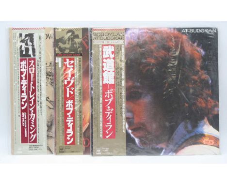 Bob Dylan, three Japanese pressing LPs to include At Budokan, 4OAP 1100-1, Saved 25AP 1890, and Slow Train Coming 25AP 1610 (