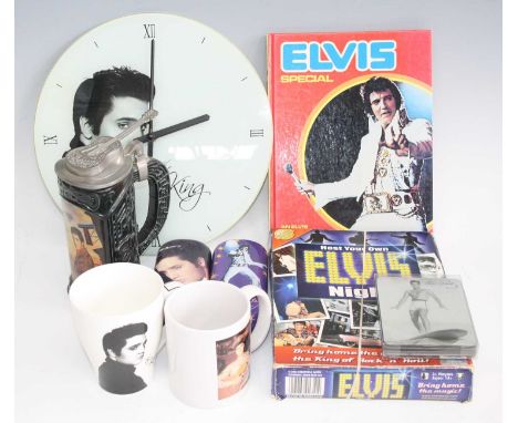 A collection of miscellaneous Elvis Presley memorabilia, to include a beer stein, metal signs, pictures, jigsaws, Elvis Speci