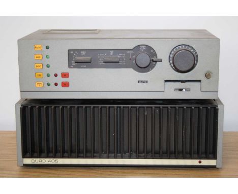 A Quad stereo 44 control unit, w.32, d.19, h.11cm, together with a 405 current dumping amplifier, w.34, d.19.5, h.11cm. (2)We