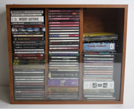A large collection of CD's various genres, artists to include R.E.M., Randy Newman, Ramblin' Jack Elliott, Ray Charles, Peg L