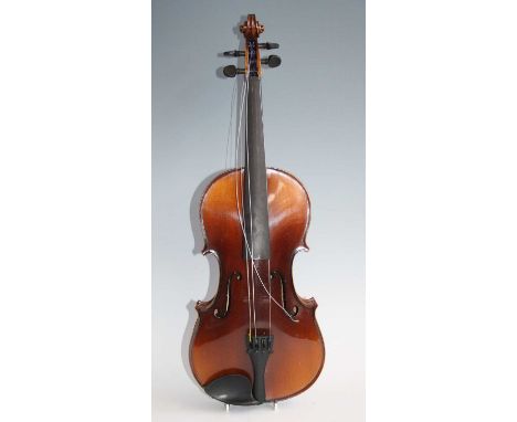 An early 20th century German violin, having a two piece maple back with spruce front, maple neck, ebony fingerboard and pegs,