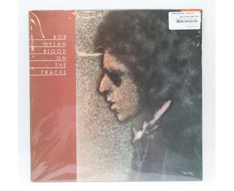 Bob Dylan - Dylan, Japanese pressing CBS 25AP 285 with Japanese lyric sheet together with Blood on the Tracks, 1974 UK plain 