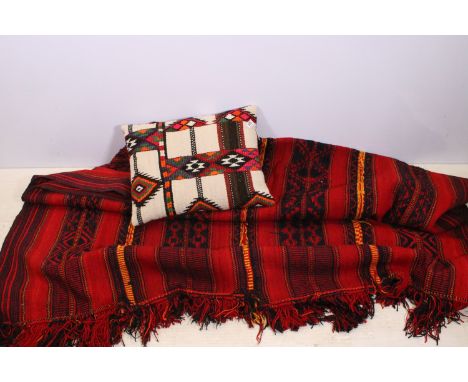 Bedouin Kilim rug and geometric pattern cushion, cushion measures 58cm x 44cm