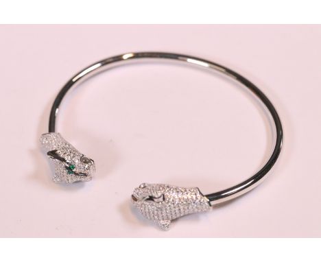 Silver designer style bangle in the form of panthers set with CZs 
