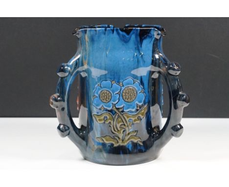 Elton Ware (Clevedon) tyg / three-handled vessel decorated with flowers on a green/blue ground, base with painted 'Elton' mar