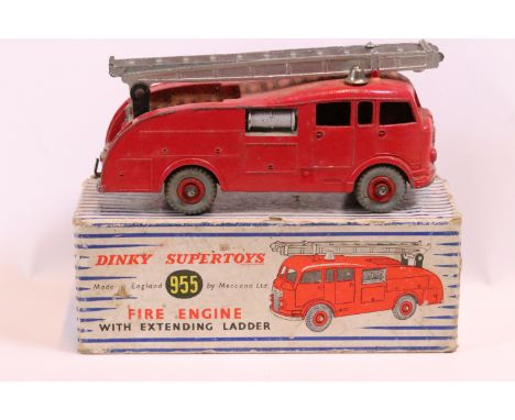 Boxed Dinky Supertoys 955 Fire Engine with extending ladder diecast model, showing paint chips but overall in a gd play worn 