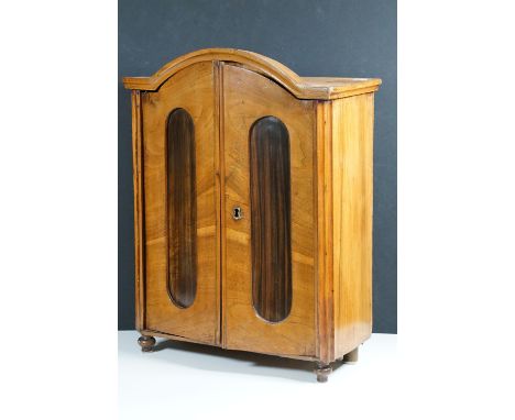 Early 20th century coromandel miniature table top apprentice wardrobe with inner shelf and hanging rail, H 51.5cm, W 38.5cm, 