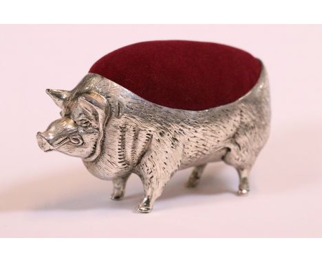 Pig pin cushion stamped '800' to the underside 