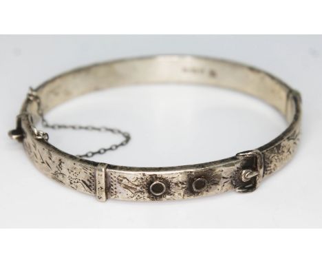 A hallmarked silver bangle.  