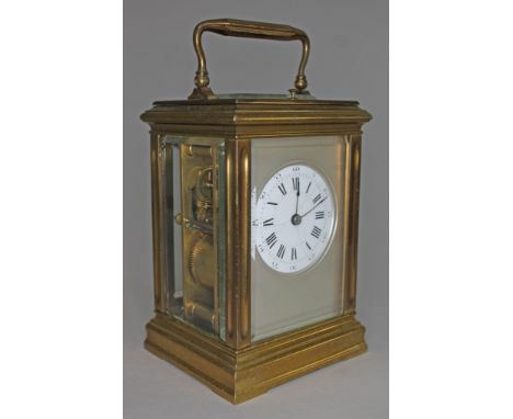 A French late 19th century four glass and gilt brass repeater carriage clock, enamel dial with Roman numerals, two train move