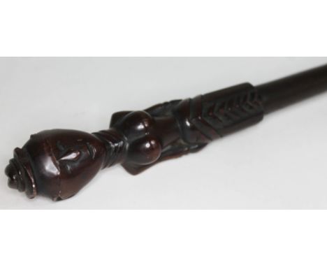 An African carved walking stick, length 85cm.  