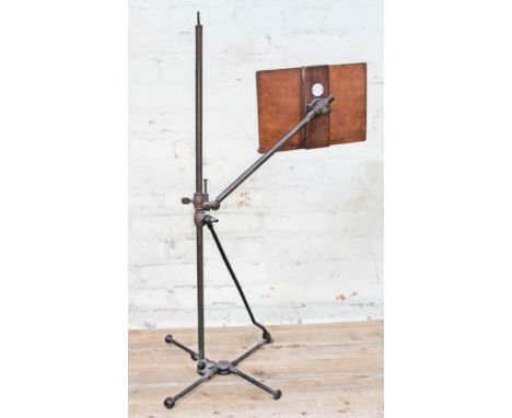 A Victorian J Carter music stand, enamel label verso.Condition: some splits present to metal as pictured with a little corros