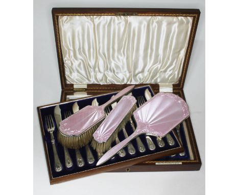 A three piece hallmarked silver and pink enamel dressing table set together with a cased set of 12 silver plated knives and f