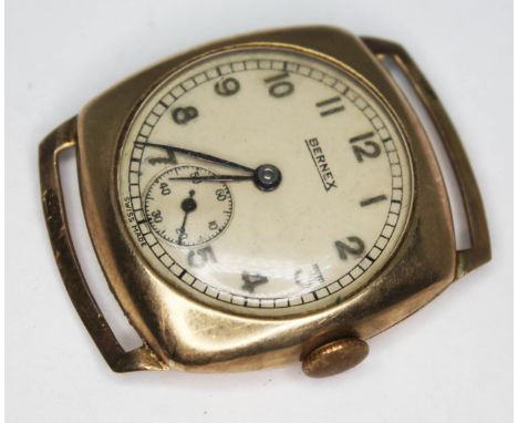 A 1950s Bernex 9ct gold manual wind wristwatch with signed champagne dial, silver Arabic numbers, black hands and seconds sub